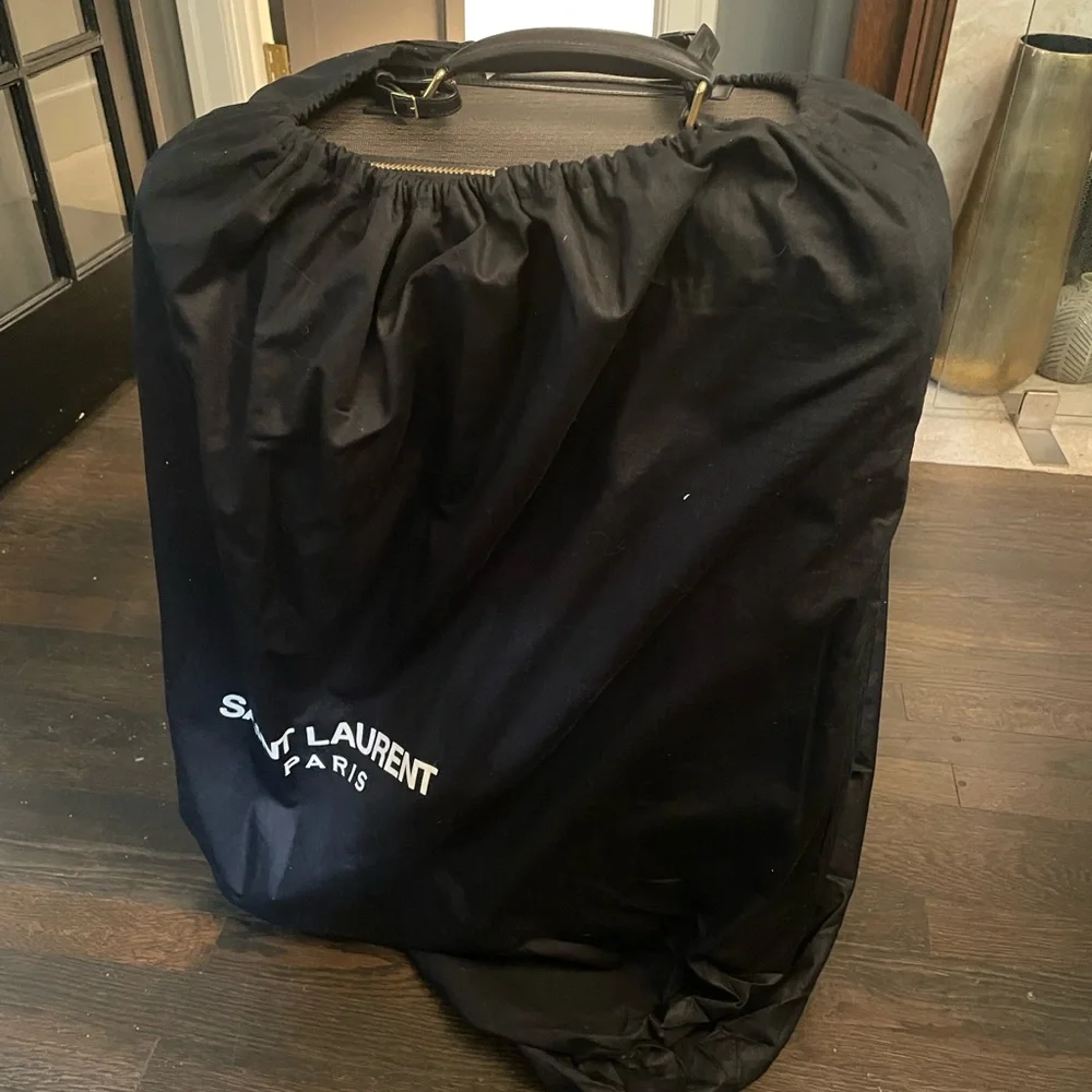 YSL Saint Laurent paris travel luggage trolley 360 wheels travel in style Italy